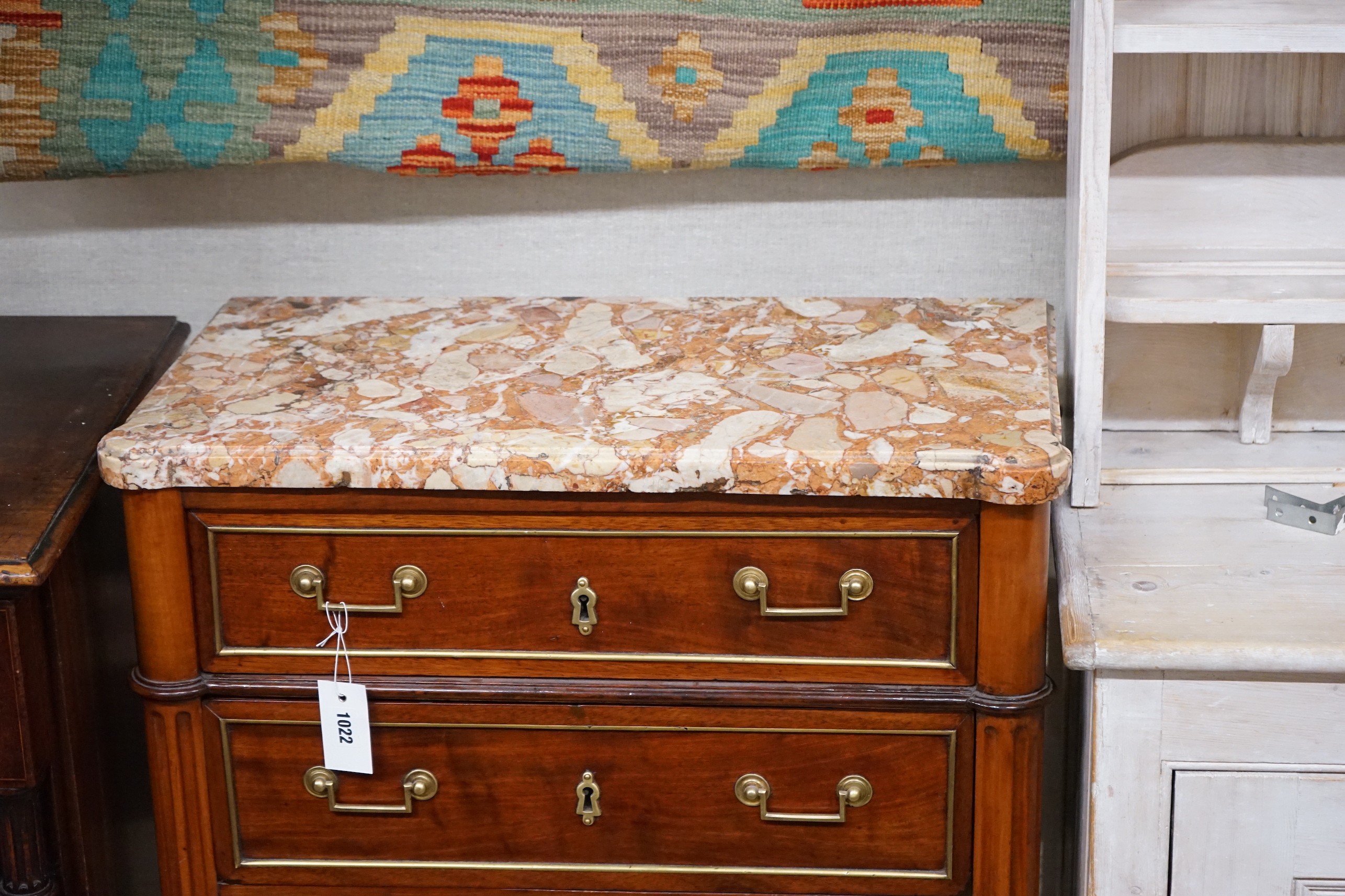 A late 19th/early 20th century French brass mounted mahogany marble top five drawer chest, width 66cm, depth 34cm, height 105cm